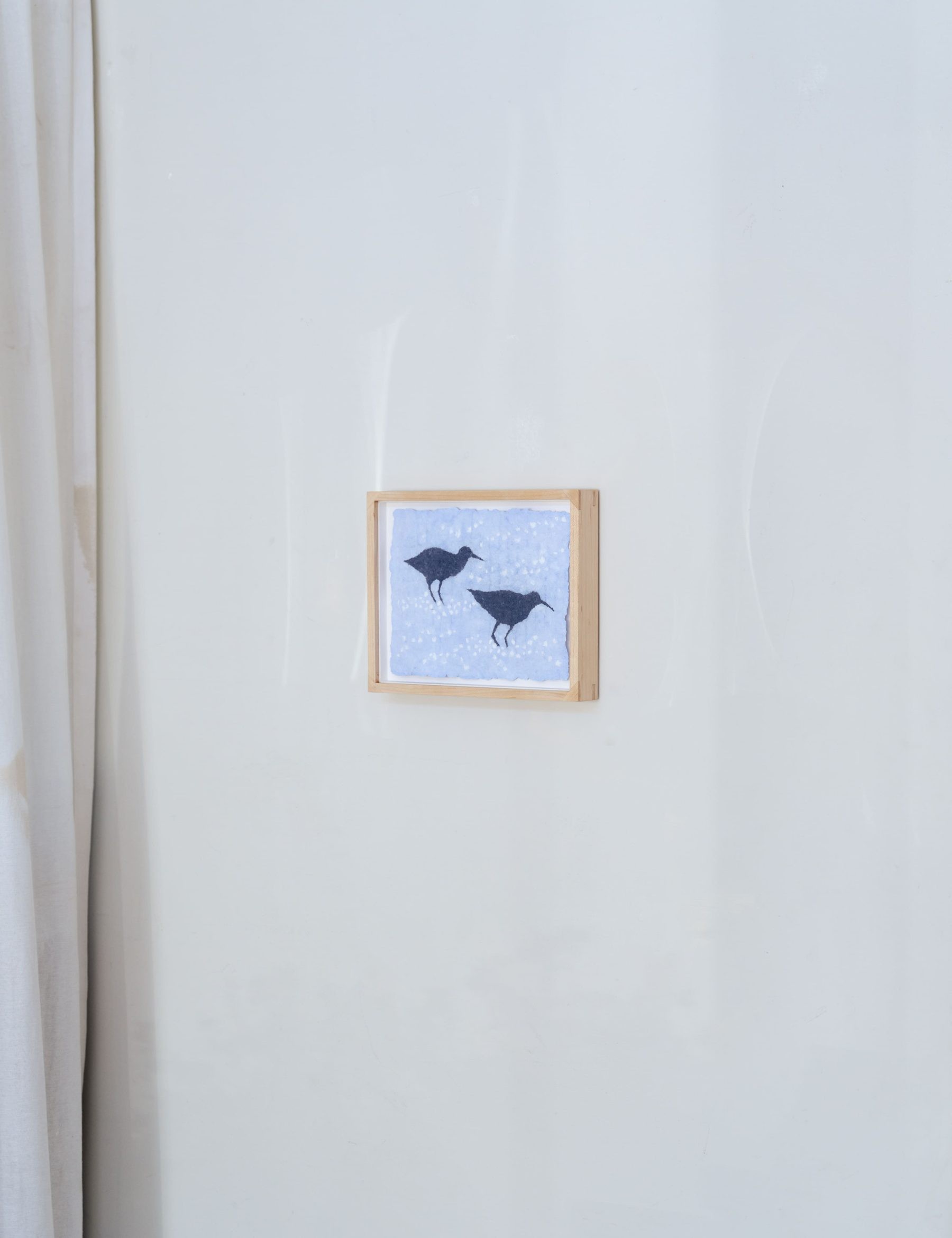 small paper pulp piece of sand pipers, made from discarded denim jeans