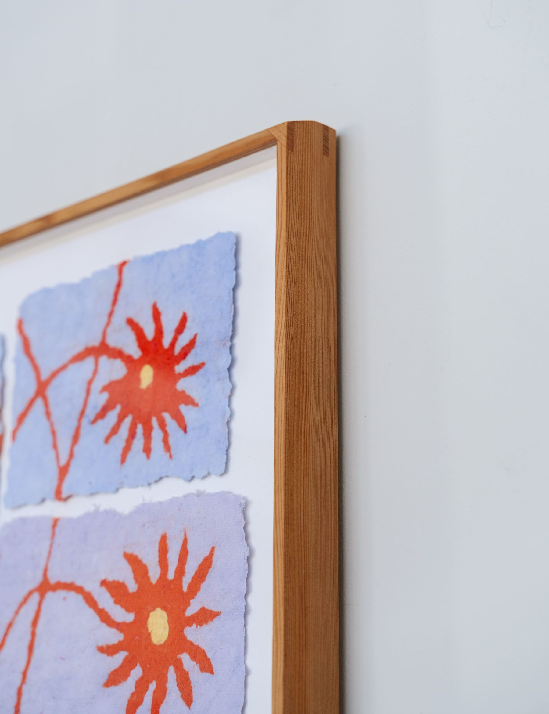 close up of hand-crafted frame and paper pulp painting