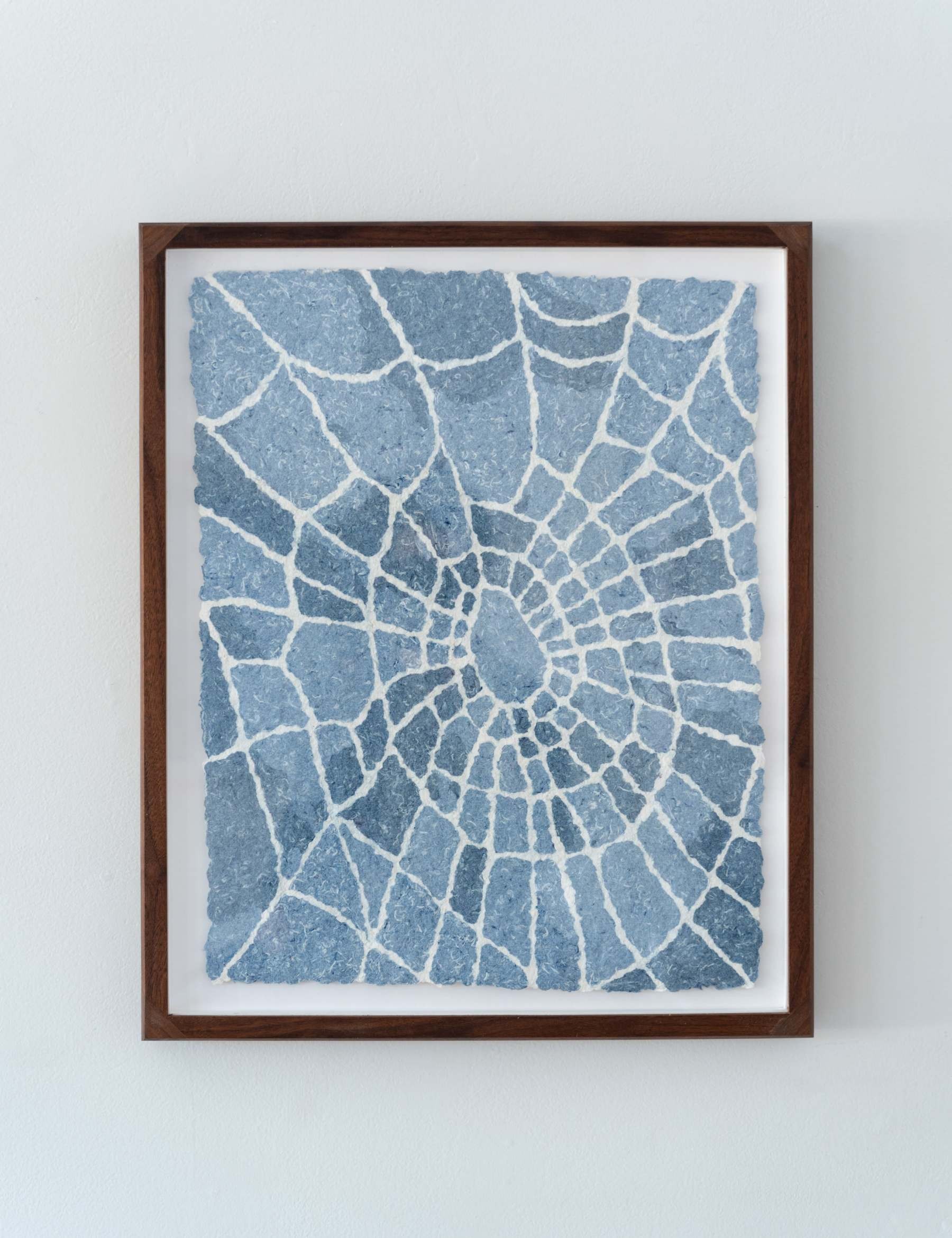 paper pulp painting of a blue denim web